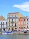 Waterfront hotel and small boat