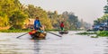 Small boat transporting people go and back to the floating market in Mekong River, Vietnam