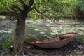 Small boat on a small river of Vietnam countryside Royalty Free Stock Photo