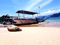 small boat in wonderful beach and blue sky in Trenggalek Indonesia