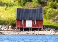 Boathouse by sea