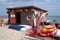 Small boating station on the Baltic beach. Royalty Free Stock Photo
