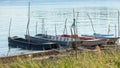 Small boats berthed along the river bank autumn day Royalty Free Stock Photo