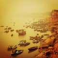 Small boats at Ganga river - vintage effect. Sunrise photo with retro filter. Royalty Free Stock Photo