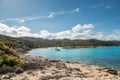 Boats in a small cove with sandy beach in Corsica Royalty Free Stock Photo