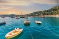 Small Boats Moored in Calm Blue Bay at Sunset Royalty Free Stock Photo