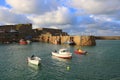 Small boats moored in harbour