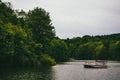 Small boats near the shore of a cove on Lake Marburg, in Codorus State Park, Pennsylvania. Royalty Free Stock Photo