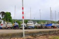 Small boats on trailers in boat park