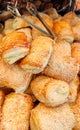 Small boreks ÃÂ¾r bourekas with sesame seeds filled by mash potatoes sold in a bakery store