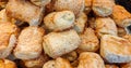 Small boreks ÃÂ¾r bourekas with sesame seeds filled by mash potatoes sold in a bakery store