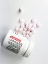 Children`s Aspirin on a White Backdrop