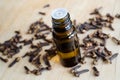 Small bottle with essential clove oil. Aromatherapy, herbal medicine and spa ingredient Royalty Free Stock Photo