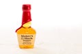 A small bottle of Kentucky Straight Bourbon Whisky on a white background.