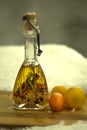 A small bottle of olive oil on the balcony in the winter. Royalty Free Stock Photo