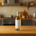 A small bottle of olive oil with a blank label on a wooden surface in a kitchen environment setting Royalty Free Stock Photo