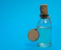 Small bottle with potion and wooden tag