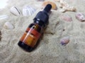 Small bottle on the sand. British Propolis.