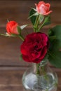 Small bouquet of roses on a wooden background Royalty Free Stock Photo