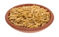 Small bowl filled with Khorasan wheat Royalty Free Stock Photo