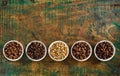 Small bowls of assorted speciality coffee beans Royalty Free Stock Photo