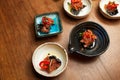 Small bowls with tuna dish, black caviar Royalty Free Stock Photo