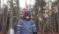 Small boy alone at forest