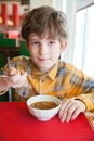 Small boy in asian restaurant Royalty Free Stock Photo