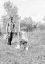 Small boy child help father in farming. new life. soils fertilizers. happy earth day. Dig grounf with shovel. father and Royalty Free Stock Photo