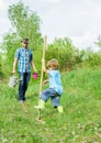 Small boy child help father in farming. new life. soils fertilizers. happy earth day. Dig grounf with shovel. father and Royalty Free Stock Photo