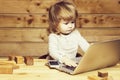 Small boy with computer and phone Royalty Free Stock Photo