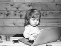 Small boy with computer and phone Royalty Free Stock Photo