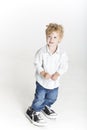 Small boy in dad's big shoes Royalty Free Stock Photo