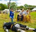 Small boy defeats large Knight Royalty Free Stock Photo