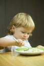 Small boy eating porridge Royalty Free Stock Photo