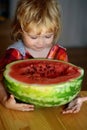 Small boy eating red watermelon Royalty Free Stock Photo