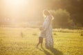 Small boy kissing belly of his pregnant mother Royalty Free Stock Photo