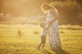 Small boy kissing belly of his pregnant mother Royalty Free Stock Photo