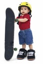 Small Boy with Large Helmet Shoes and Skateboard Royalty Free Stock Photo