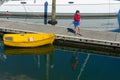 Small boy of marina pier fishing Royalty Free Stock Photo