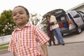 Small Boy With Parents In Background Royalty Free Stock Photo