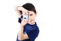 Small boy photographing vwith digital camera