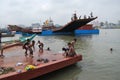 Small boy play on the Buriganga at Sadarghat.