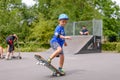 Small boy playing with his skateboard Royalty Free Stock Photo