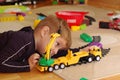 Small boy playing with toy truck Royalty Free Stock Photo