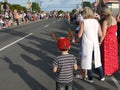 New Zealand: small town Christmas parade waiting boy