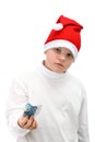 Small boy in Santa hat with paper money isolated Royalty Free Stock Photo