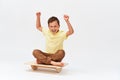 Small boy is sitting on a special simulator for training vestibular apparatus Royalty Free Stock Photo