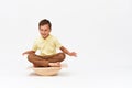 Small boy is sitting on a special simulator for training vestibular apparatus Royalty Free Stock Photo