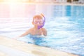 Small boy training snorkelling in swimming pool Royalty Free Stock Photo